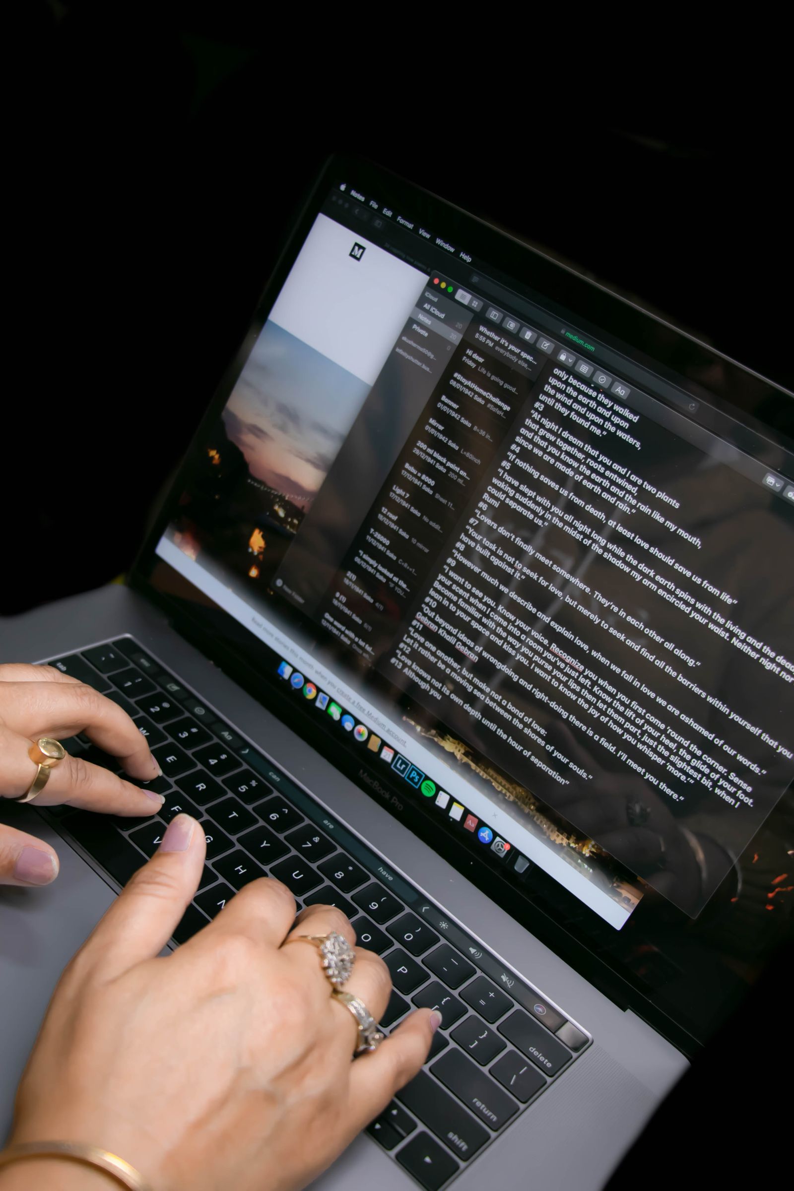 A woman using chat while typing on a laptop at home